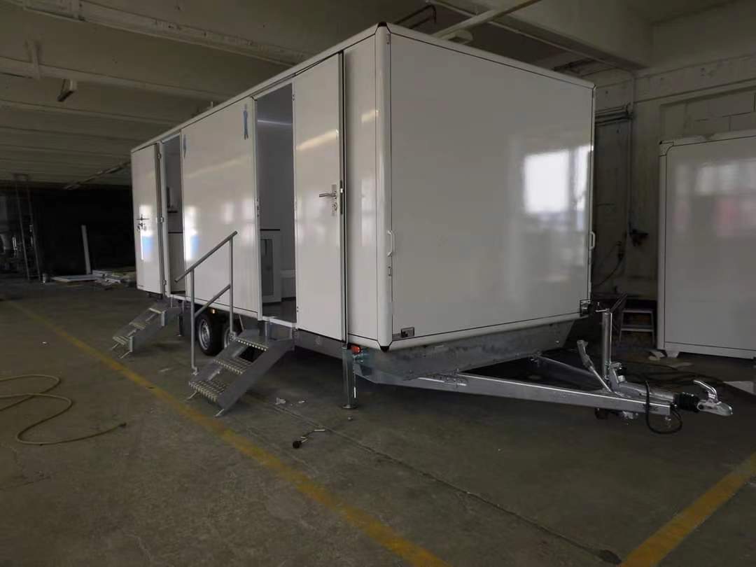 WHITE MOBILE TOILET TRAILER